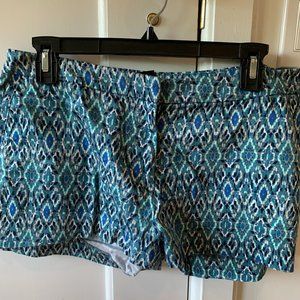 H&M blue and white patterned shorts, size 10